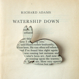Illustration for article titled Brooches Made From Classic Books Let You Wear Your Favorite Words